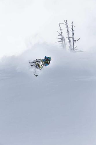 Duncan Lee jumping on snowmobile