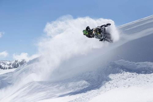 Duncan Lee jumping on snowmobile