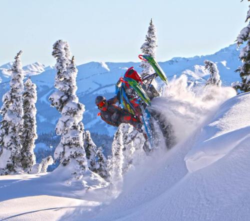 Duncan Lee riding snowmobile