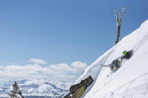 Duncan Lee riding snowmobile